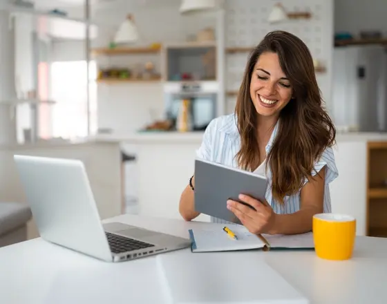 Younger white woman at computer